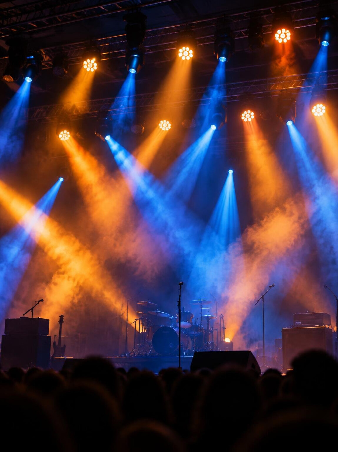 Colorful stage lighting rig with beams during a show